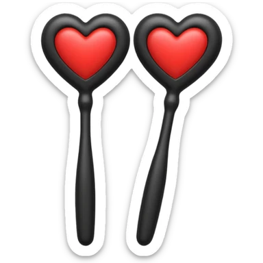 two black massage wands with a heart centred above them sticker
