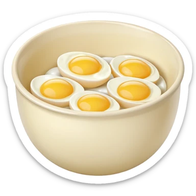 mixing bowl with uncracked eggs and butter sticker