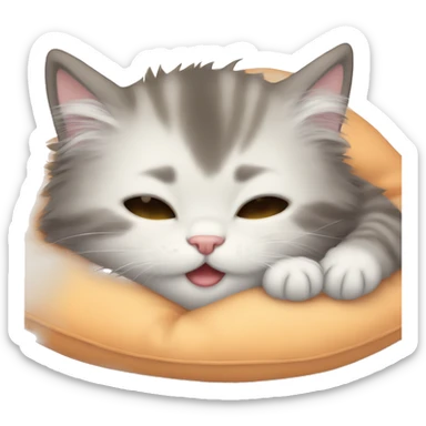 Fluffy kitten sleeping on a soft pillow sticker