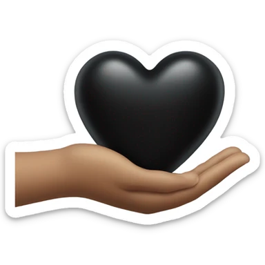 hand holding a black heart sticker