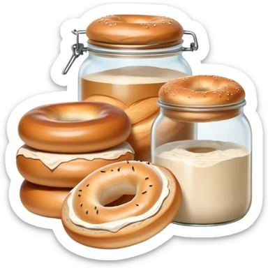 sourdough starter in a glass jar and a loaf of bread and a bagel sticker