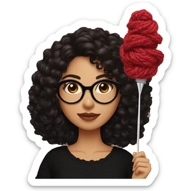 Hispanic woman with black glasses long dark brown curly hair holding small crochet needle and yarn wearing a black shirt with lace sticker