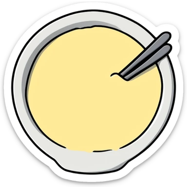 creamy garlic aioli sauce in a small dish sticker