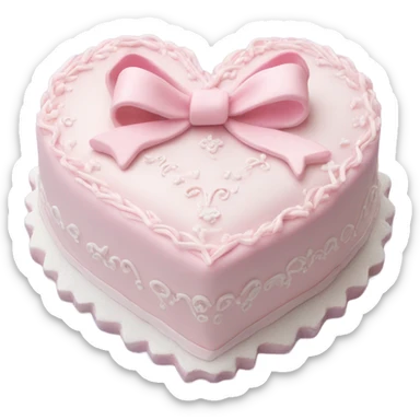Pastel pink heart shaped cake with fancy white icing and bows sticker