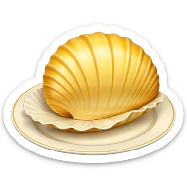 butter in the shape of a shell on a  vintage plate sticker