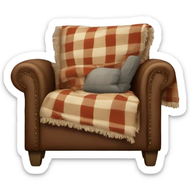 A comfy armchair with a plaid throw draped over it sticker