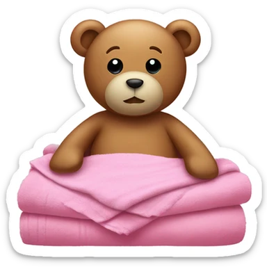 Teddy in bed with pink sheets and a towel sticker