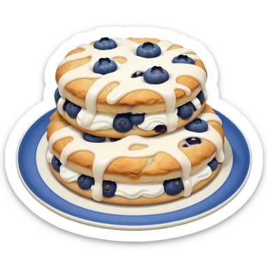 plate of 2 blueberry biscuits with white icing swirl on top sticker
