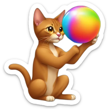 Abyssinian cat playing with a colorful fur ball sticker