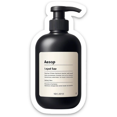 Liquid soap bottle by brand Aesop – black bottle with white label sticker
