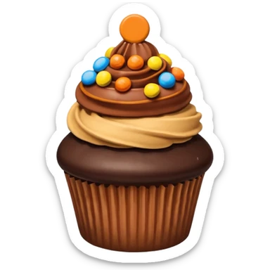 Cupcake that’s been chocolate dipped with Reese’s pieces on top sticker