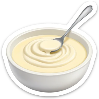 bowl of creamy garlic aioli sauce with a spoon sticker