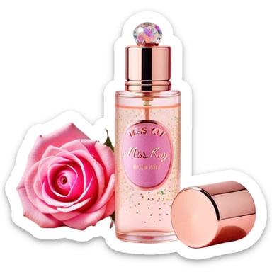A **slim, cylindrical perfume bottle** with a **transparent glass body**, a **rose gold metallic cap**, and a **pink label decorated with colorful sprinkles**. The label features the brand name "MISS KAY" and the fragrance name "CUTIE PIE." The design is **playful, feminine, and compact**, ideal for carrying on the go. sticker