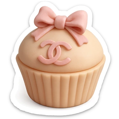 pastel peach Chanel cupcake with a pink bow and logo sticker