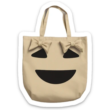 a sand color tote bag made with soft cotton with a bow on top sticker