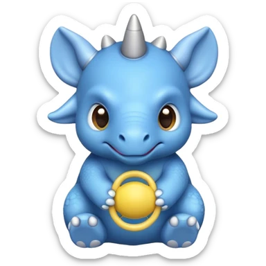 A small blue baby triceratops toy with stubby horns and a pacifier sticker