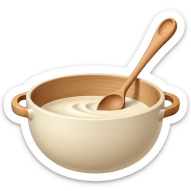 a cream ceramic mixing bowl with a wooden spoon stirring sticker