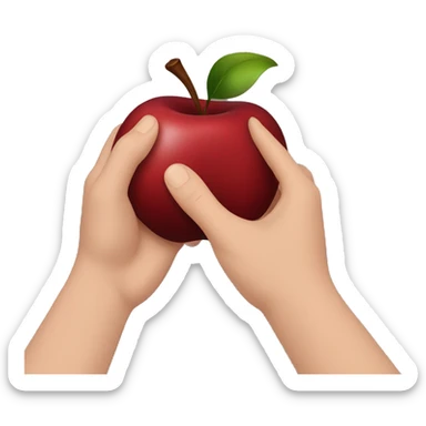 hands cupping a dark red apple sticker