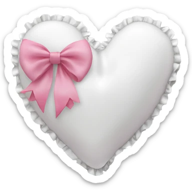 White heart shaped pillow with ruffles and pink bow sticker