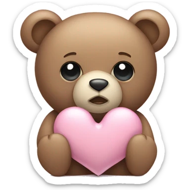 Teddy bear with sad eyes holding a pastel pink heart sticker