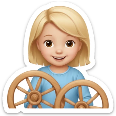 girl baby playing with wheel sticker