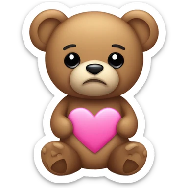 Teddy bear with sad eyes holding a pink heart sticker