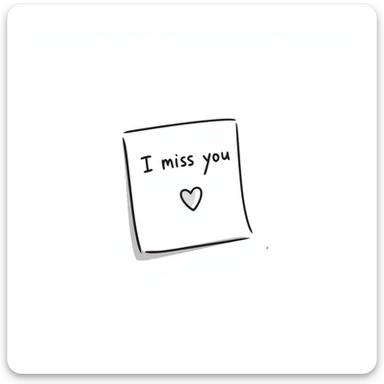 Sticky note that says "I miss you" with a heart sticker