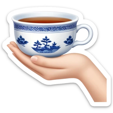 hand holding a traditional Chinese blue and white porcelain tea cup without handle sticker