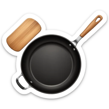 a black pan and spatula inside sticker