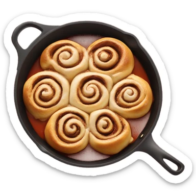 frying pan filled with cinnamon rolls and christmas sauce sticker