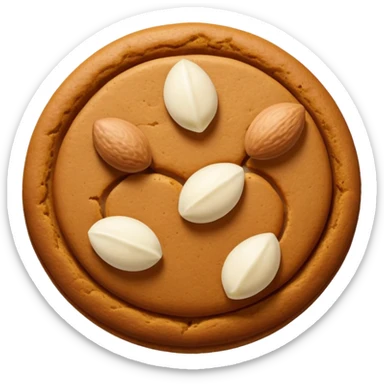round gingerbread with three white almonds on top, seen from above sticker