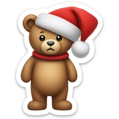 Teddy bear in a red hat with a Christmas tree sticker