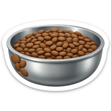 A shallow silver metal bowl with deep brown flat a rounded kibbles sticker