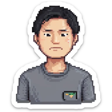 Asian man in a gray shirt with a frown sticker
