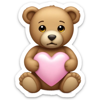 tan teddy bear holding a light pink heart sticker