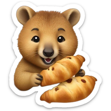 a quokka eating a croissant sticker