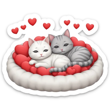 White cat and gray cat sleeping together in a bed full of hearts sticker