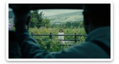 A portrait of a person in the foreground, blurred plants in the foreground (frame within a frame), a wooden fence and colorfull flowers in the midground, rolling hills in the background, cinematic depth of field, layered composition, natural lighting sticker