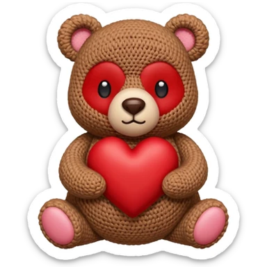 chubby crochet bear holding a tiny heart sticker