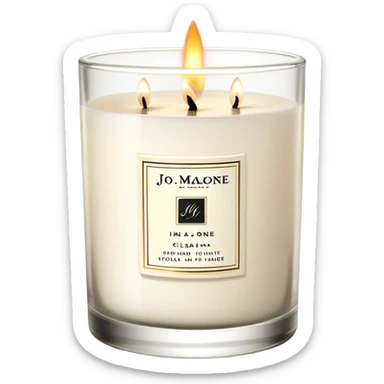 Elegant Jo Malone luxury candle in a clear glass jar with a simple label and a burning flame sticker