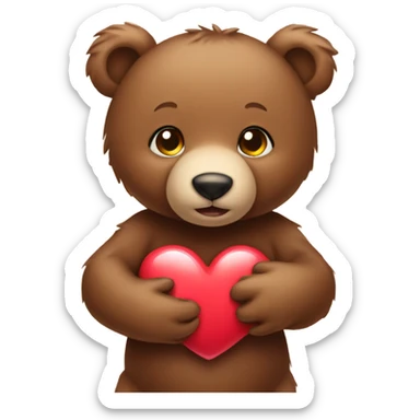 Baby brown bear holding a heart sticker