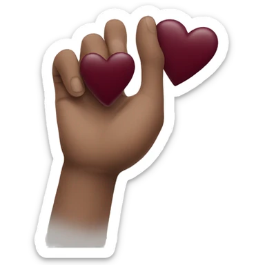 white hand holding a burgundy heart sticker