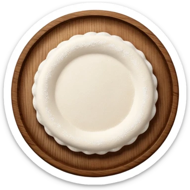 small sprinkles of flour on circular wooden plate sticker