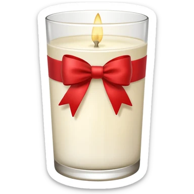 Soft vanilla long glass candle, with little red bow sticker