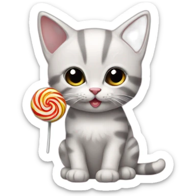 A kitten eats a lollipop sticker