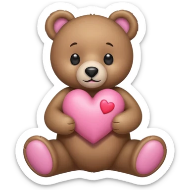 A stuffed Bear holding a pink heart sticker
