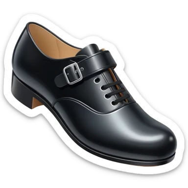 a girls black tap shoe with a velcro clasp sticker