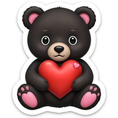 Black stuffed bear with a heart sticker