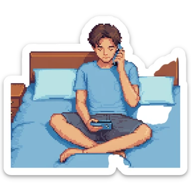 boy in a blue bed, on his phone, wearing a light blue t-shirt sticker
