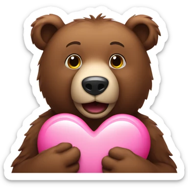 a brown bear holding a pink heart sticker
